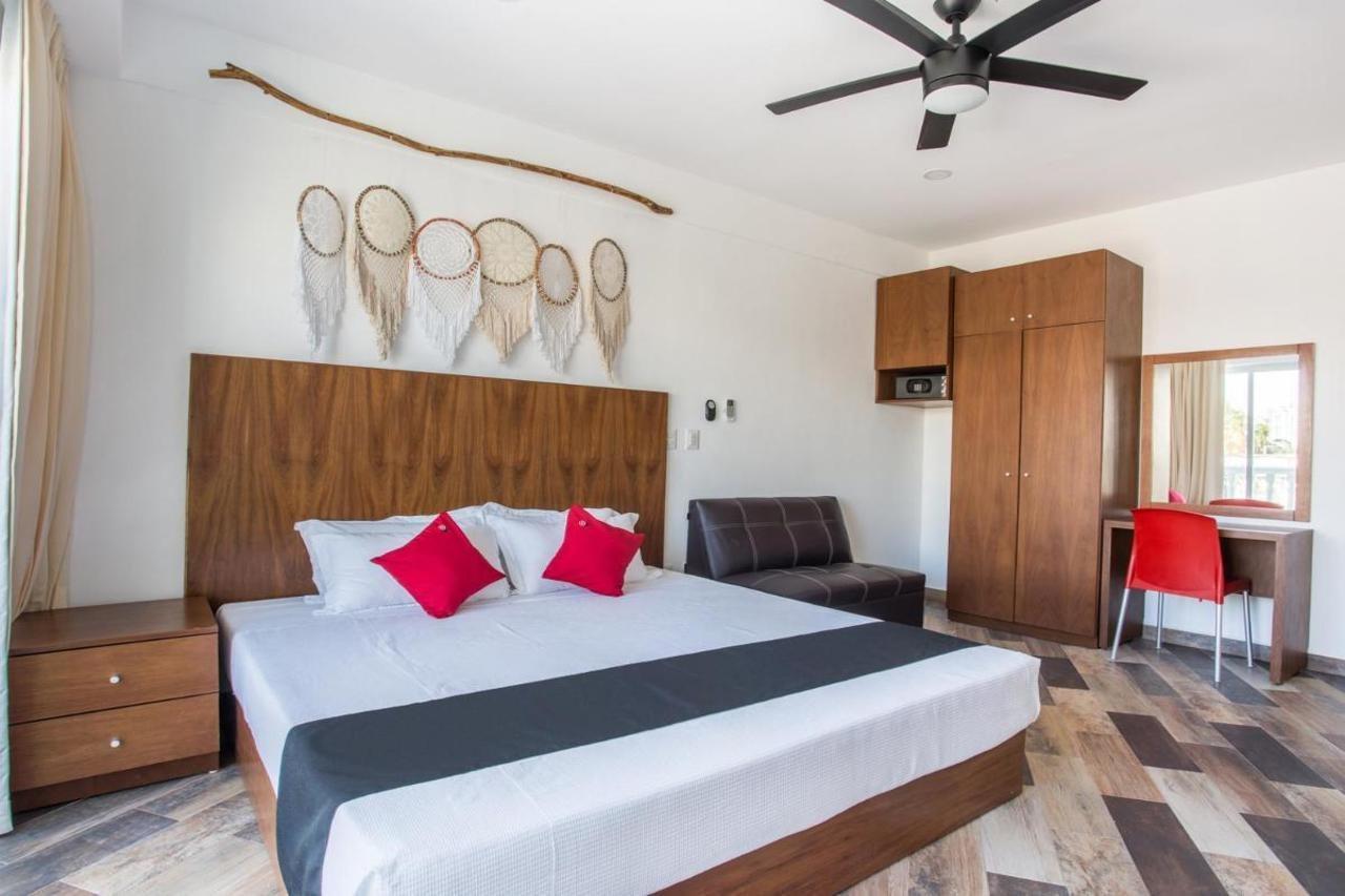 Capital O Cancun Ocean View, Cancún Exterior foto A bedroom at the hotel
