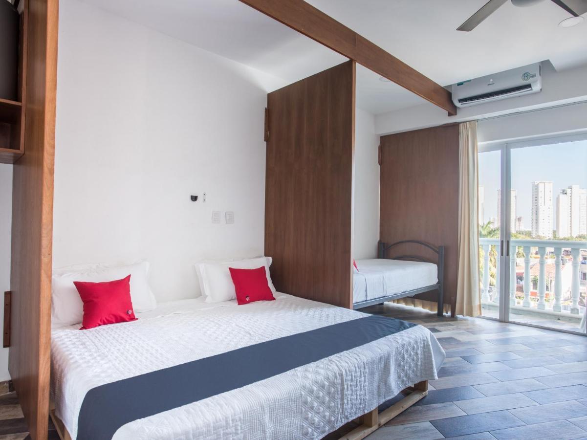 Capital O Cancun Ocean View, Cancún Exterior foto A bedroom at the hotel